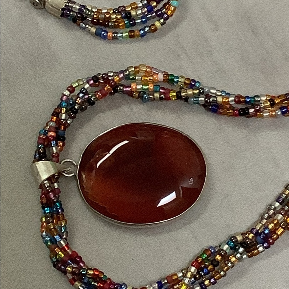 Multicolor Beaded Necklace with Red Stone Pendant